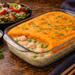 Fish and prawn pie with salad