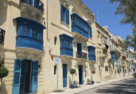 Blue Balconies in Valetta Street with limestone housing and Blue Balconies in Valetta