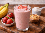 Fresh pink smoothie with strawberries and bananas