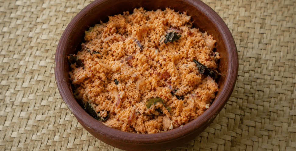 Spiced Coconut sambol in a clay pot Spiced Coconut sambol in a clay pot
